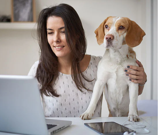 Girl Holding Dog